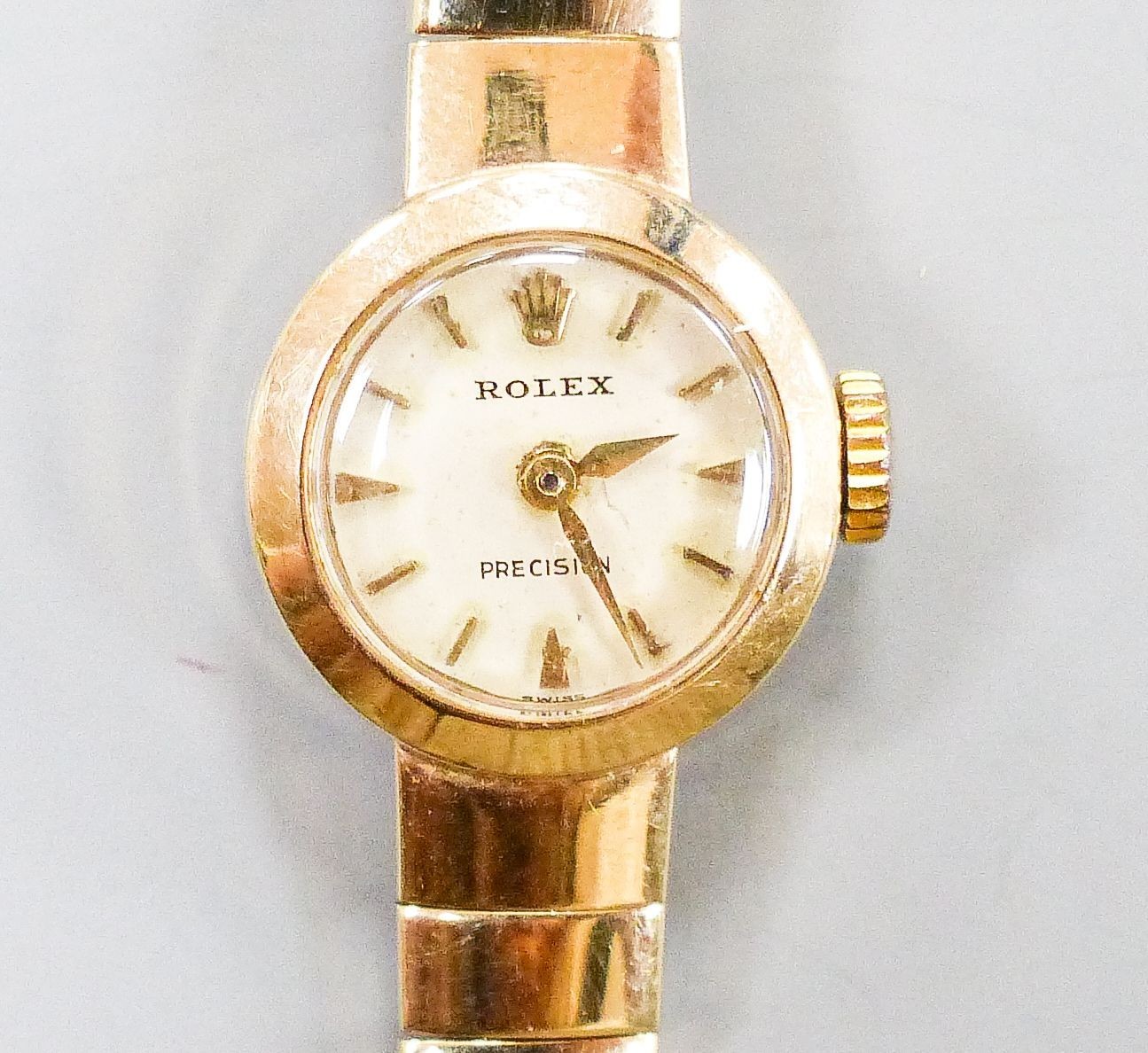 A lady's 9ct gold Rolex manual wind wrist watch on 9ct gold strap, case diameter 15mm